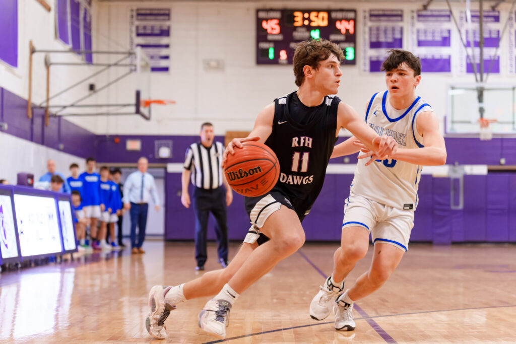 Nic Economou drives to the basket for Rumson