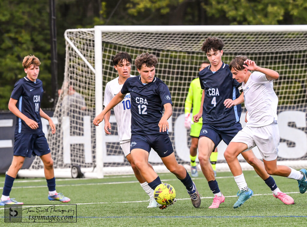 CBA William Drechsler 2 - Shore Sports Insider CBA senior Will Dreschler dribbles through traffic during a regular-season match vs. Holmdel. (Photo: Tom Smith | tspsportsimages.com) - CBA William Drechsler 2
