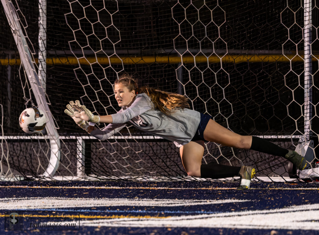 FT Violet Matthews makes the save on PK to give FT the advantage - Shore Sports Insider Violet Matthews makes a diving save on a penalty kick against Howell in the CJG4 semifinal round. 11/12/25. Photo by Tom Smith - FT Violet Matthews makes the save on PK to give FT the advantage