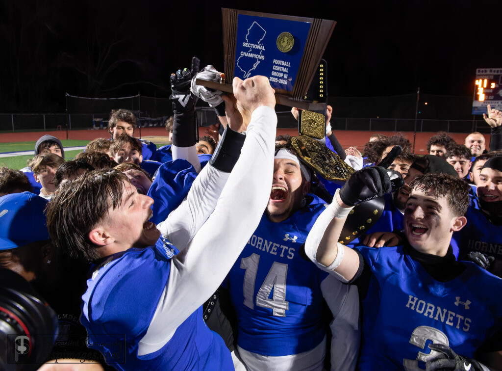 Holmdel football - Shore Sports Insider Hold it up high! Jack Cannon and Holmdel celebrate winning the program's first state sectional title. (Photo by Tom Smith/tspimages.com) - Holmdel football