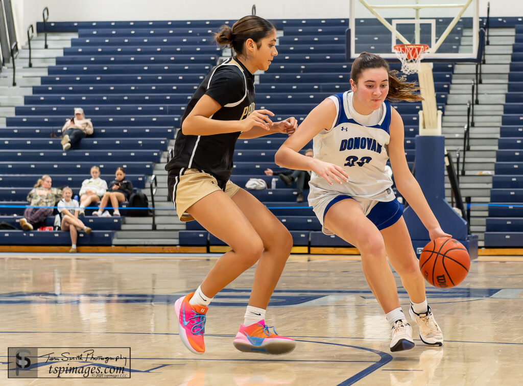 DC Sarah Franks - Shore Sports Insider Donovan Catholic junior Sarah Franks drives the lane as Angela Forese keeps step during the Donavan Catholic vs Pt Pleasant Boro KWCC Christmas Classic at the RWJBarnabas Health Arena in Toms River, . 12/30/25 Photo Credit: Tom Smith | tspsportsimages.com - DC Sarah Franks
