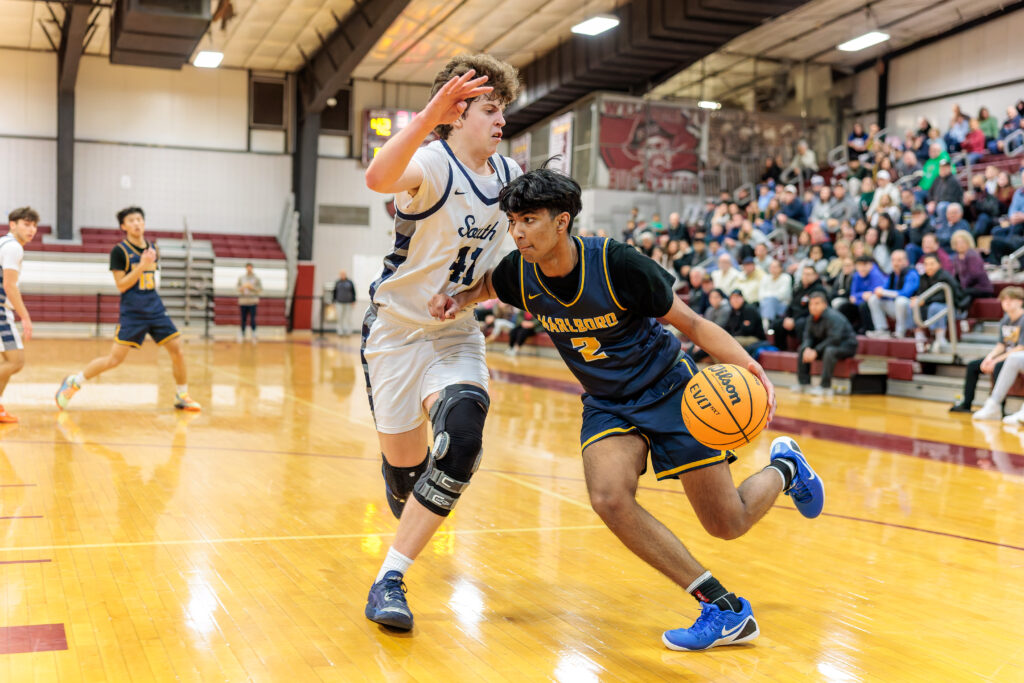 Marlboro senior Ajay Mathews drives against Middletown South senior Beckett Oliver. (Photo: Patrick Olivero) - Marlboro vs Midd South