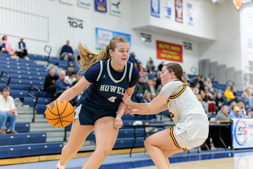 Kylee Beam- Howell - Shore Sports Insider Howell's Kylee Beam drives to the basket in the first round of the Kevin Williams Christmas Classic (Photo by Patrick Olivero) - Kylee Beam- Howell