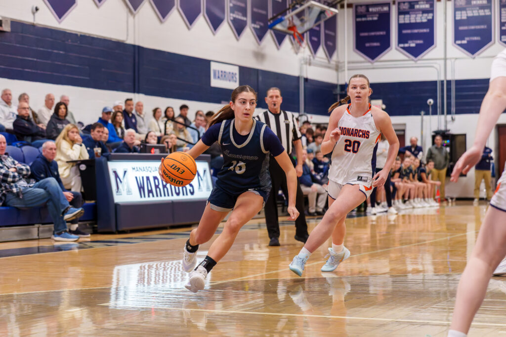 Calista Vowteras - Shore Sports Insider Calista Vowteras driving to the basket against Trinity Hall in a 38-23 victory. 1/3/26 Photo by Patrick Olivero - Calista Vowteras