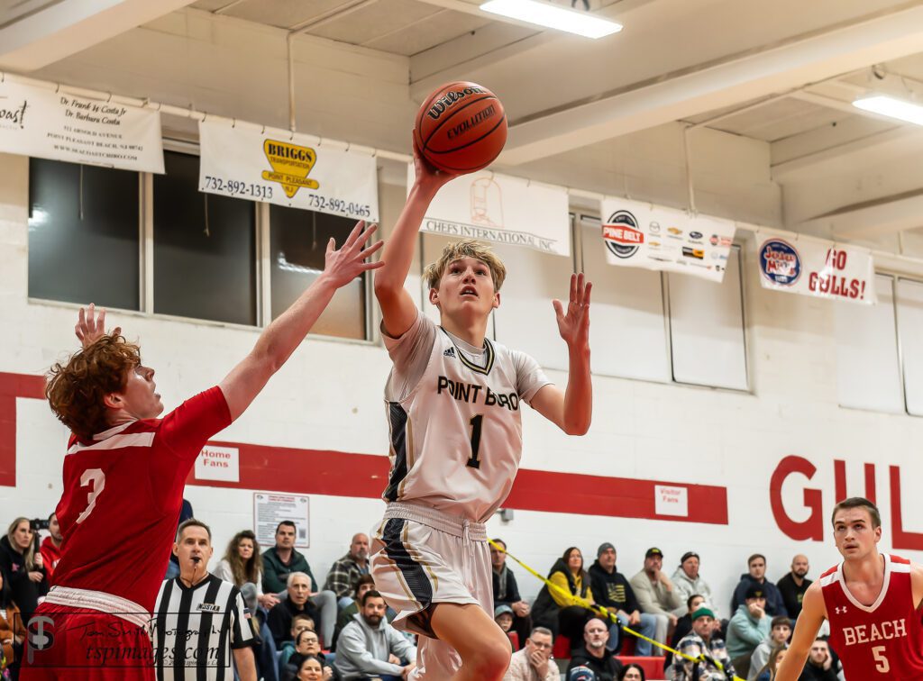 Point Boro junior Hunter Hynes puts up a shot at Point Beach. (Photo: Tom Smith | tspsportsimages.com) - Pt Boro at Pt Beach