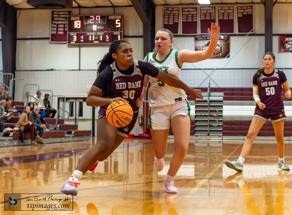 Red Bank Synai Blychanton - Shore Sports Insider Red Bank's Synai Blynchanton drives to the basket Photo Credit: Tom Smith | tspsportsimages.com - Red Bank Synai Blychanton