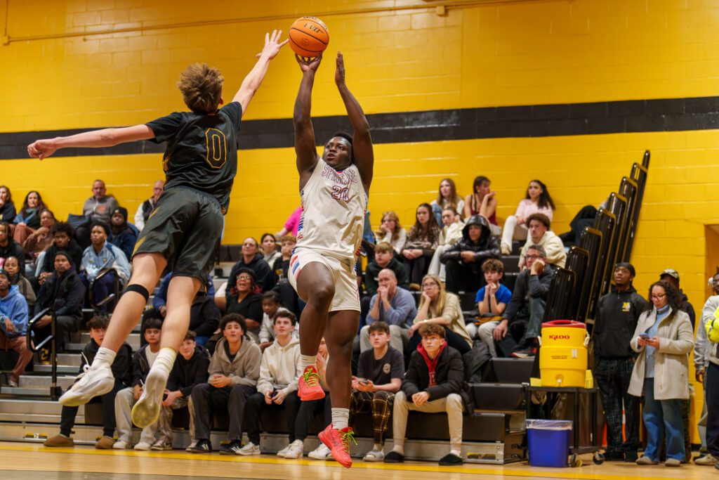 Ocean's Aidan Saint Louis knocks down a fadeaway (Photo by Patrick Olivero) - Ocean- Aidan Saint Louis