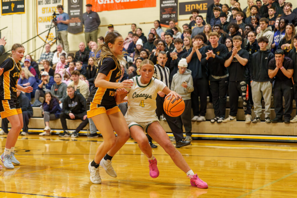 RBC- Katie Liggio - Shore Sports Insider Red Bank Catholic's Katie Liggio protects the ball from a defender (Photo by Patrick Olivero) - RBC- Katie Liggio