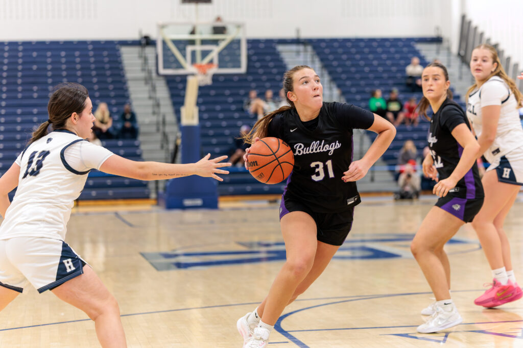 Rumson-Fair Haven Grace Smith - Shore Sports Insider Rumson-Fair Haven's Grace Smith drives to the basket (Photo by Patrick Olivero) - Rumson-Fair Haven Grace Smith