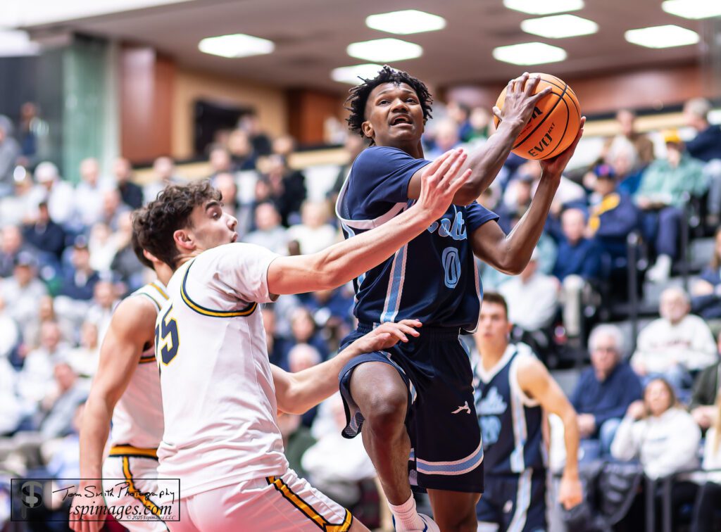 CBA sophomore Izayah Cooper drives on Marlboro senior Drew Lubeck. (Photo: Tom Smith | tspsportsimages.com) - CBA Izayah Cooper