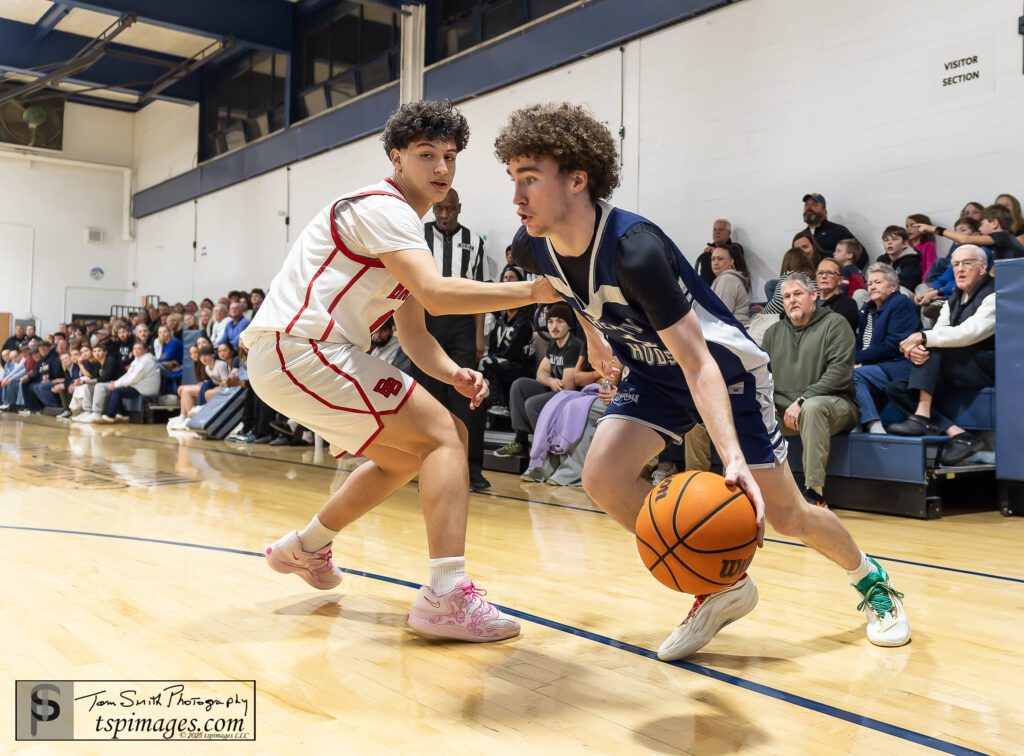 Henry Hudson senior Bill Quinn drives by Bound Brook's Fabian Montero. (Photo: Tom Smith | tspsportsimages.com) - Henry Hudson Billy Quinn