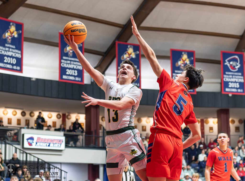 Red Bank Catholic junior Ryder Ciorciari flips up a shot over Wall junior Navin Tu. (Photo: Tom Smith | tspsportsimages.com) - RBC Ryder Ciorciari