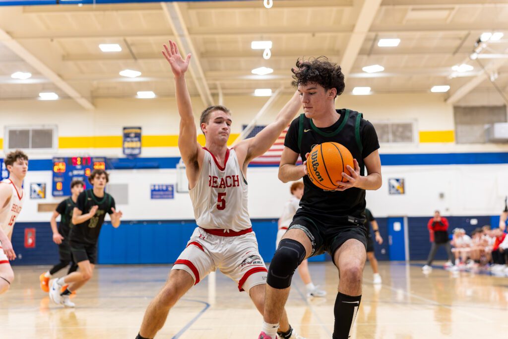 Pt Beach vs Brick Memorial - Shore Sports Insider Brick Memorial senior Sean Collins defended by Point Beach senior Jacob Edgecomb. (Photo: Patrick Olivero) - Pt Beach vs Brick Memorial