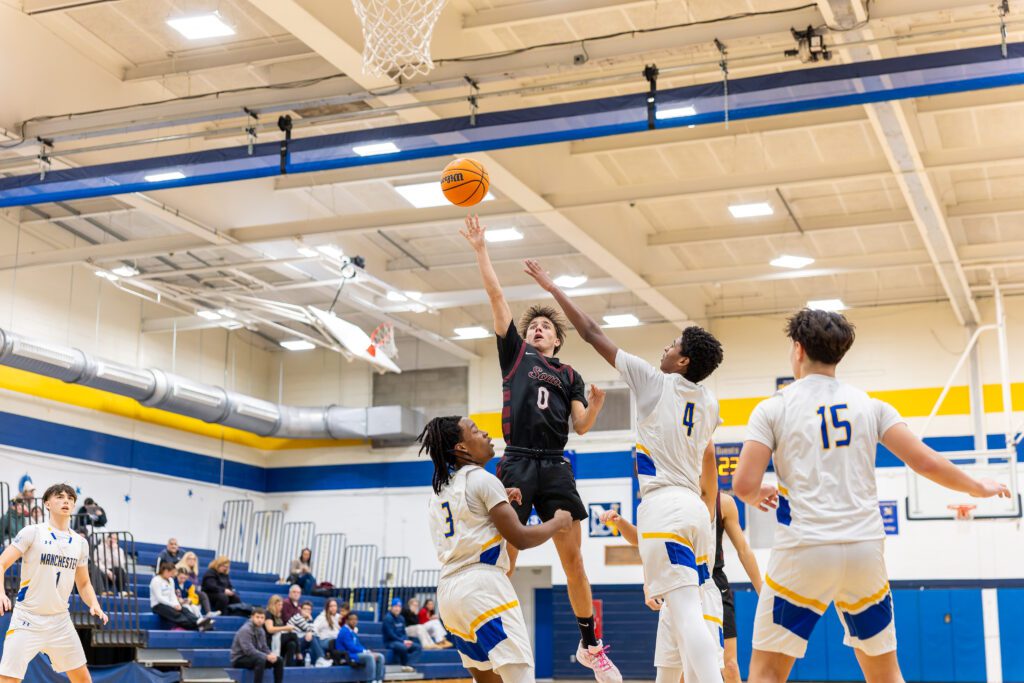 Toms River South senior Shane Gambarony puts up a shot vs. Manchester at the Kevin Williams Christmas Classic. (Photo: Patrick Olivero) - TR South vs Manchester