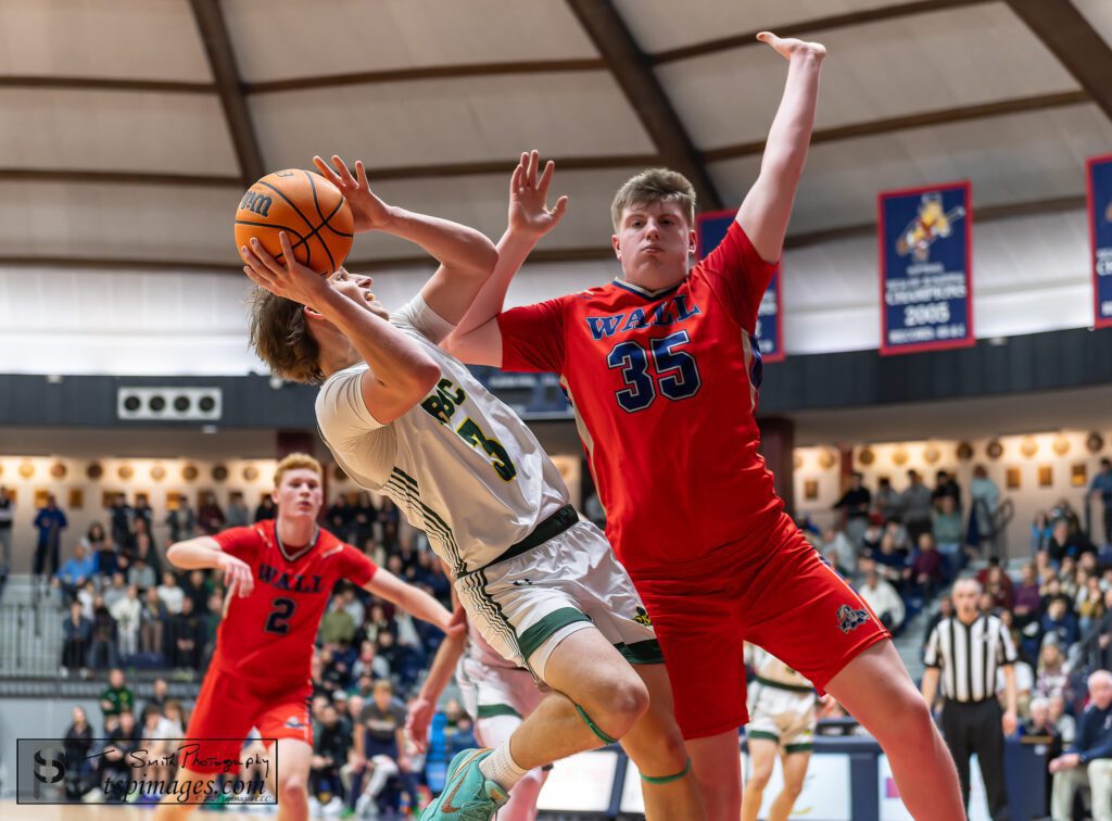 Red Bank Catholic junior Gavin Biasi attempts to get off a shot over Wall junior Donovan Buist. (Photo: Tom Smith | tspsportsimages.com) - Wall vs RBC