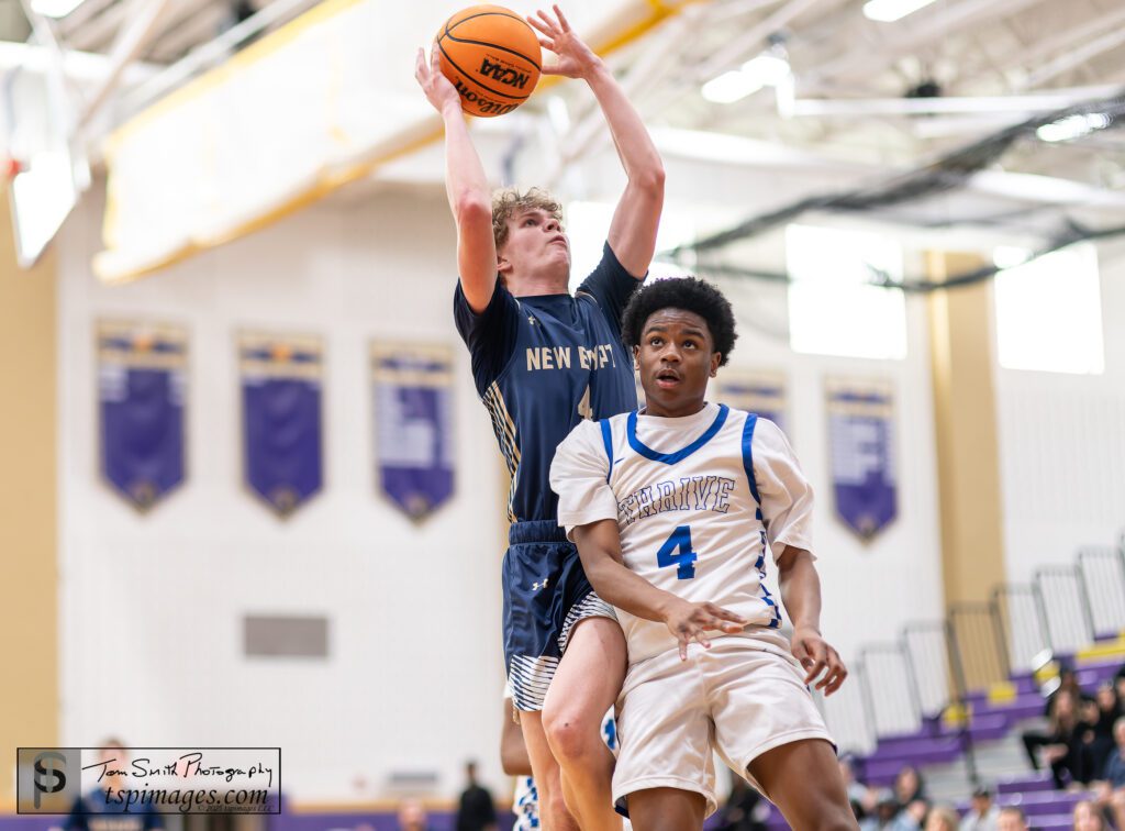 New Egypt senior Clyde Ferris takes a shot over Thrive senior Teriyon Page. (Photo: Tom Smith | tspsportsimages.com) - New Egypt vs Thrive