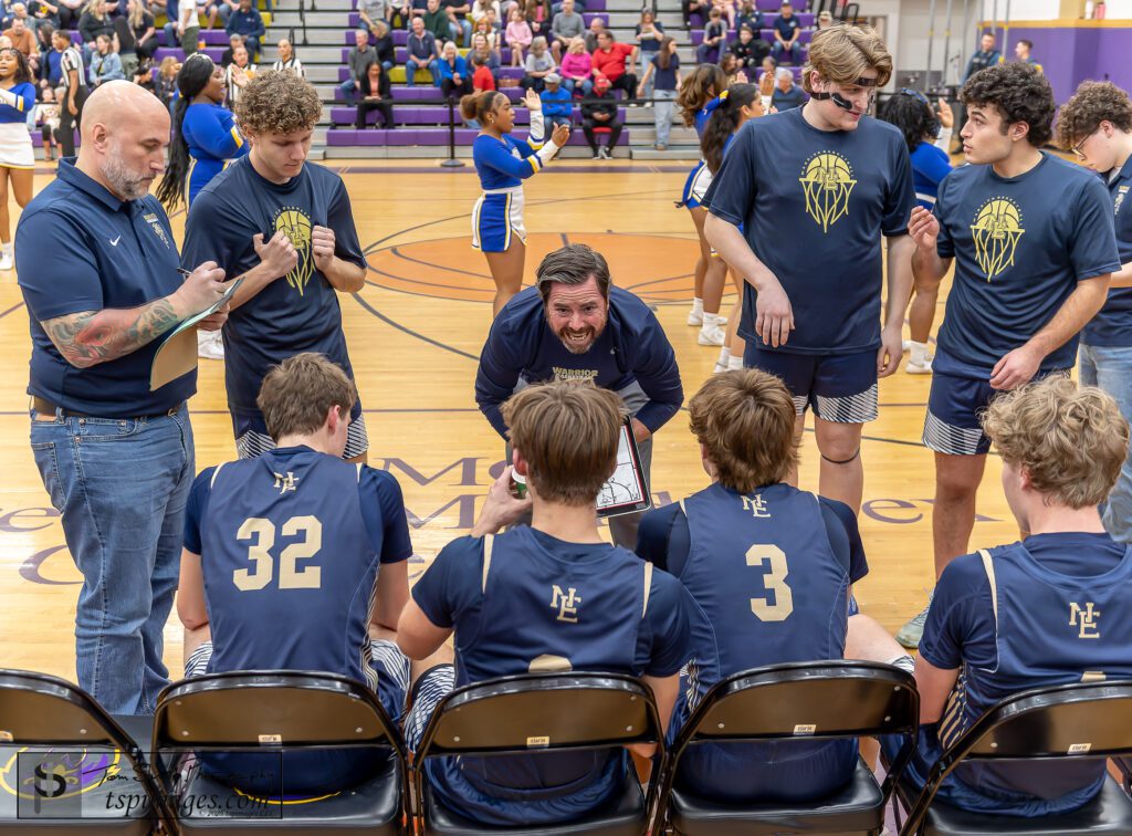 New Egypt coach Mick Hughes directs a timeout huddle during the NJSIAA Group II semifinal vs. Thrive at Monroe High School. (Photo: Tom Smith | tspsportsimages.com) - New Egypt vs Thrive