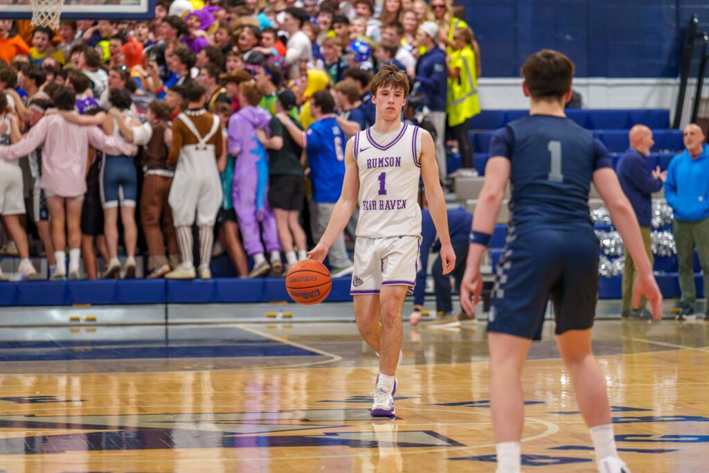 Connor Moore - Shore Sports Insider Rumson-Fair Haven junior Casey Moore guarded by Manasquan sophomore Sean Bilodeau. (Photo: Patrick Olivero) - Connor Moore