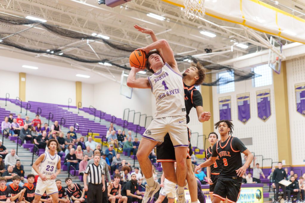 Rumson Fair Haven junior Casey Moore defended by Middle Township's Mike Farrow. (Photo: Patrick Olivero) - Rumson vs Middle