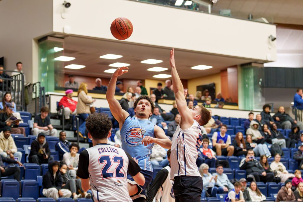 Freehold Boro's Mike Cush puts up a shot over Brick Memorial's Sean Collins and Point Beach's Jacob Edgecomb. (Photo: Patrick Olivero) - Senior All-Star Game Mike Cush