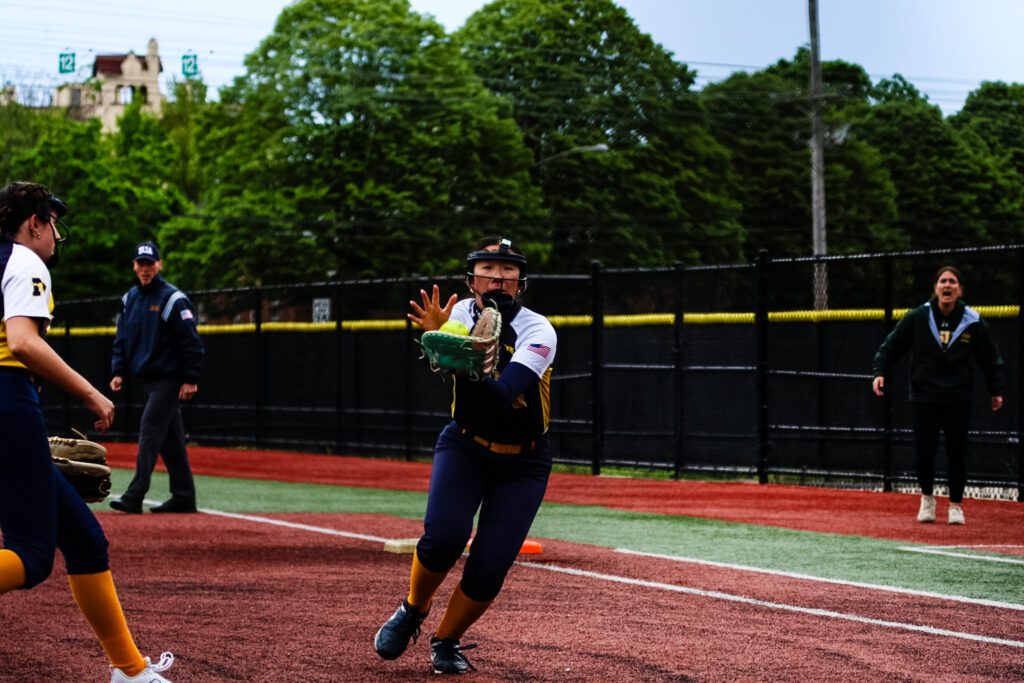 Ashlee Chen making a catch on a pop-up bunt attempt by RBC. 4/28/26 photo by Samantha Mayer - Ashlee Chen