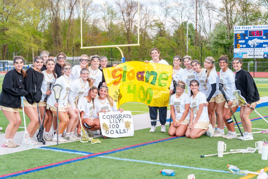 Point Boro's Sloane Schwertheim recorded her 400th career save and Lily Scalabrini scored her 100th career goal against Holmdel (Photo by Patrick Olivero) - Point Boro Sloane Schwertheim