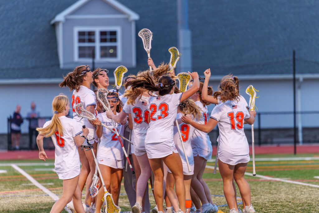 Trinity Hall celebrates their rivalry win over Rumson-Fair Haven (Photo by Patrick Olivero) - Trinity Hall celebrates rivalry win