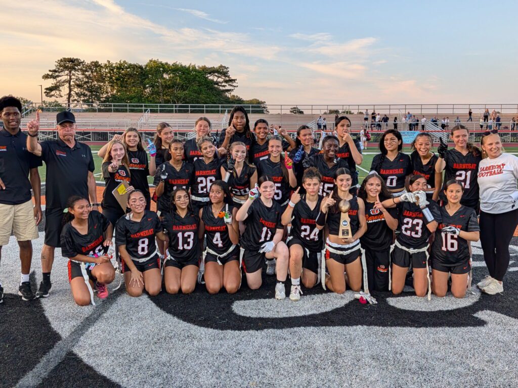 Barnegat Trophy - Shore Sports Insider Barnegat celebrates winning the 2026 Girls Flag Football Shore Conference Tournament title. (Photo by Scott Stump) - Barnegat Trophy