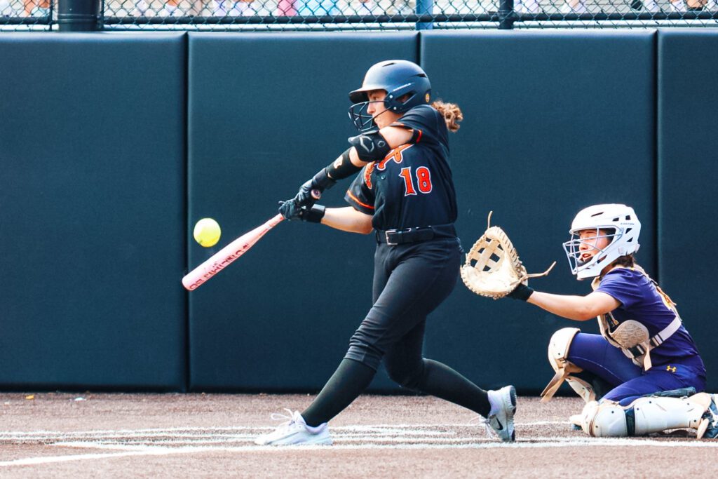 Riley Schmidt hits a home run in the Group 2 Championship game at Ivy Hill Park. 6/12/26 Photo by Samantha Mayer - Riley Schmidt