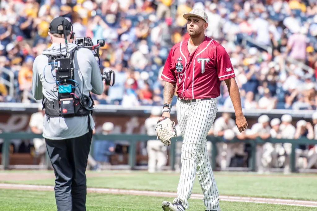 Zach Crotchfelt College WS - Shore Sports Insider Zach Crotchfelt walks off the mound at the College World Series. (Photo Courtesy: Ethan Prendergast/TroyTrojans.com) - Zach Crotchfelt College WS